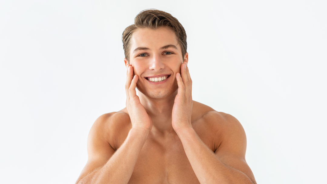 A confident man with revitalized skin, thanks to Sculptra treatment.