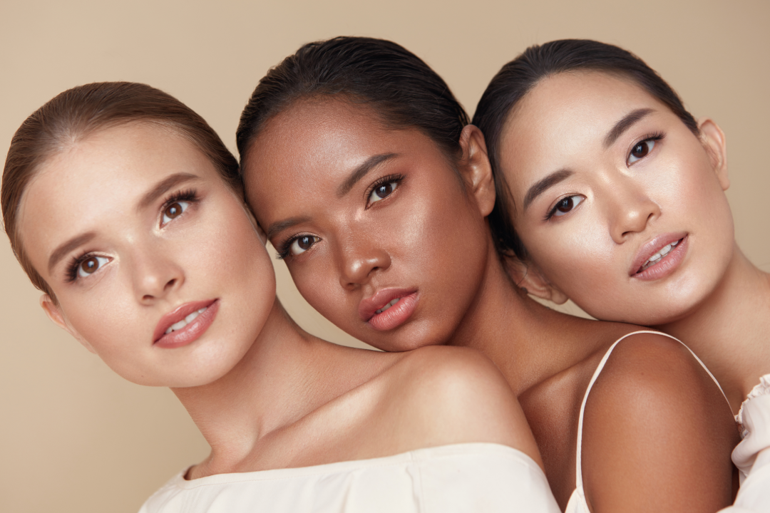 Three women showcasing radiant skin, representing medspa treatments.