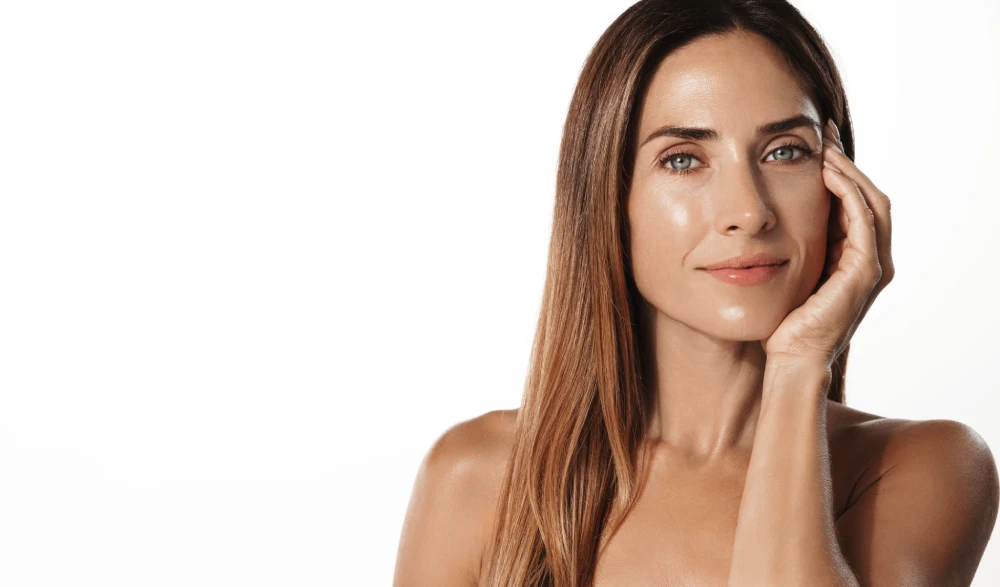 Woman with smooth jawline showing results from a med spa treatment.
