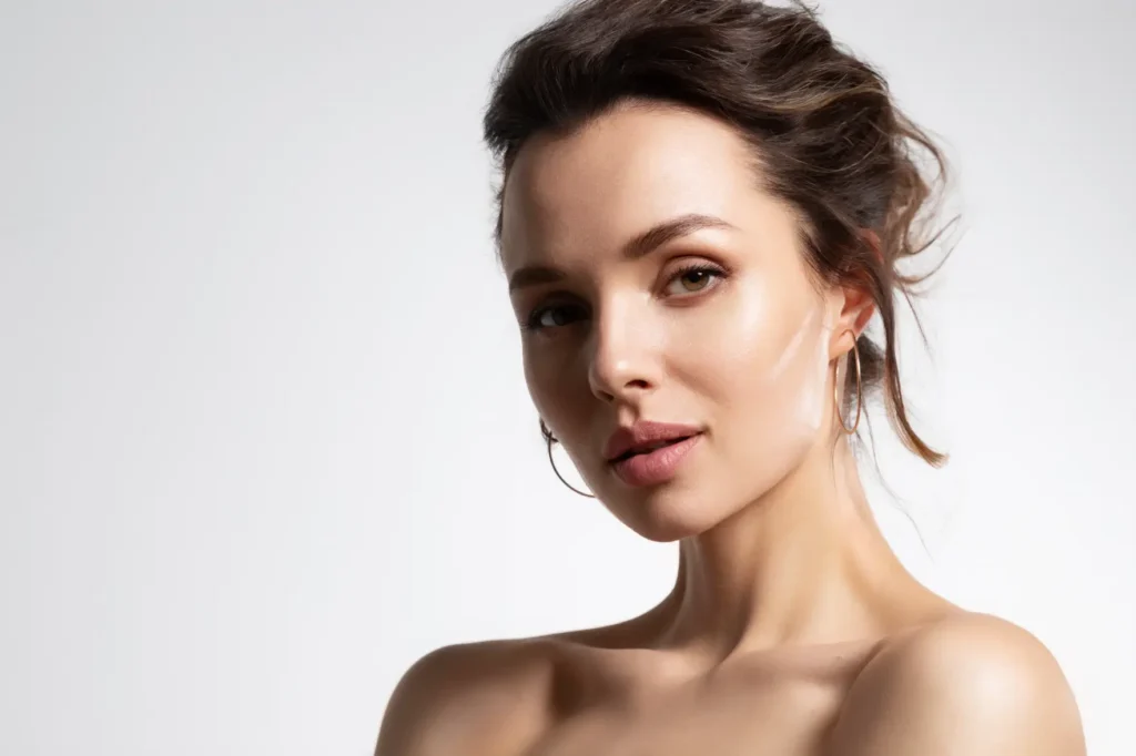 Close-up of a woman with smooth glowing skin and natural makeup